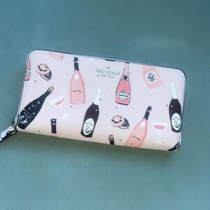 Kate Spade Laurel Way Neda Champagne Bottles Wallet Pink. Never worn